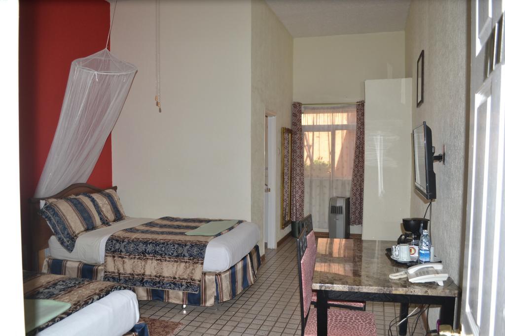 Executive Airport Hotel Εντέμπε Δωμάτιο φωτογραφία